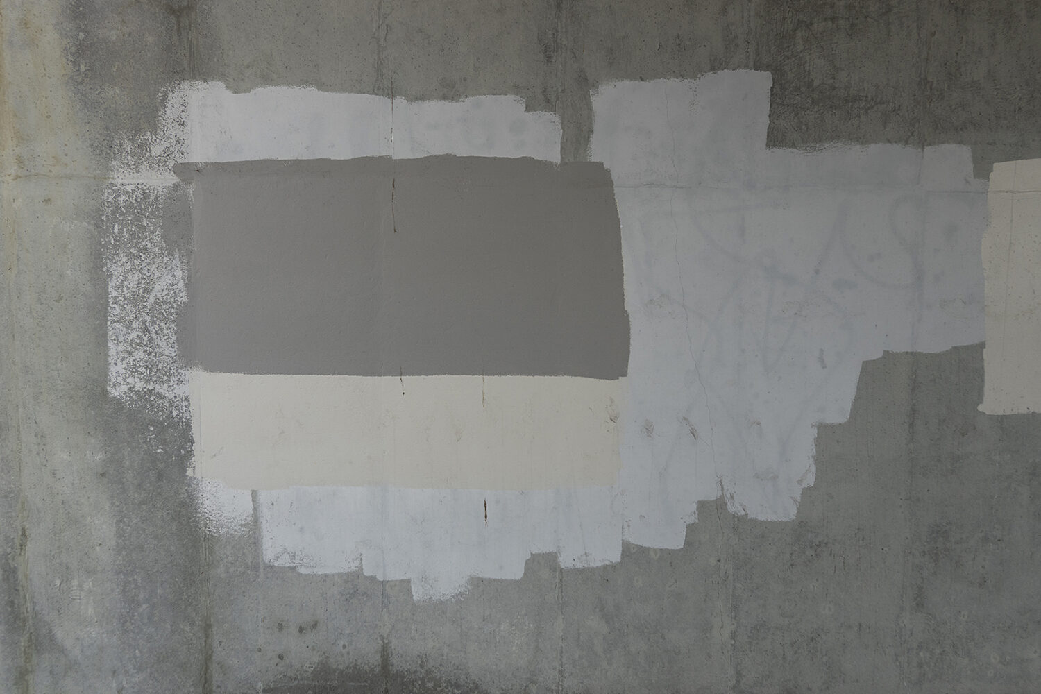 Graffiti cover-up paint on wall under Expressway on East Ridge Road