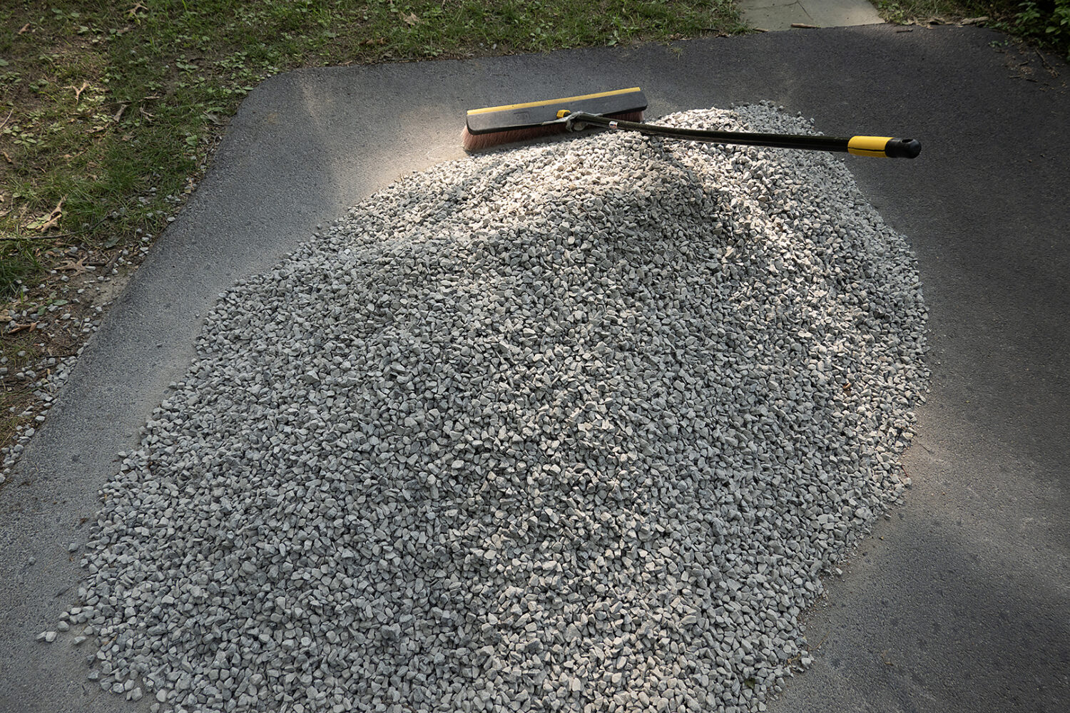 Stone pile and broom at Jared's house