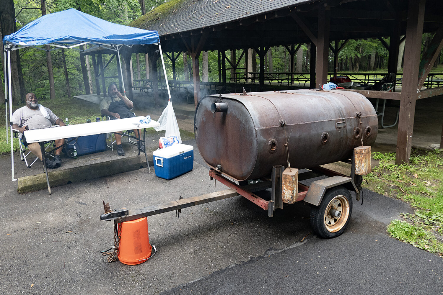 Two big guys and their smoker in Durand Eastman Park