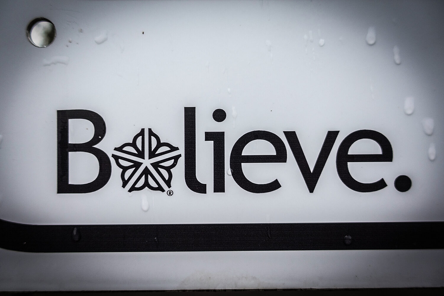 Rochester mark in the word "Believe" at beach